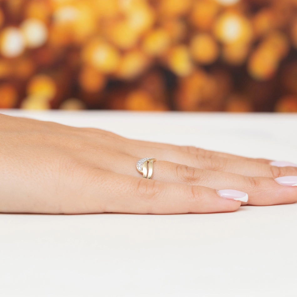 Goldring mit Zirkonia Wellen