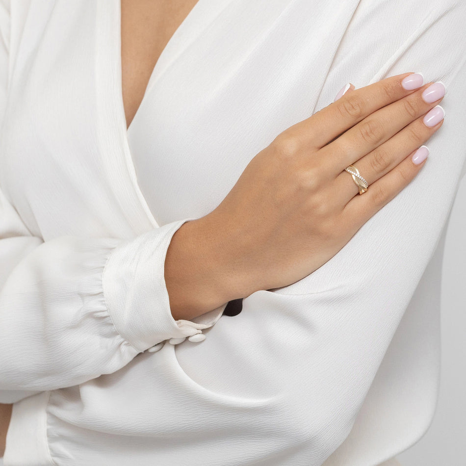 Goldring mit Zirkonia Wellen