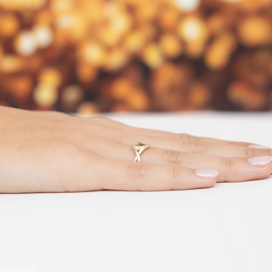 Gold geflochtener Ring mit Zirkonia Herz