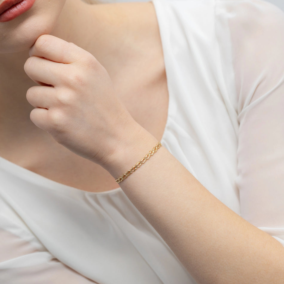 Goldarmband mit doppelten Wellen