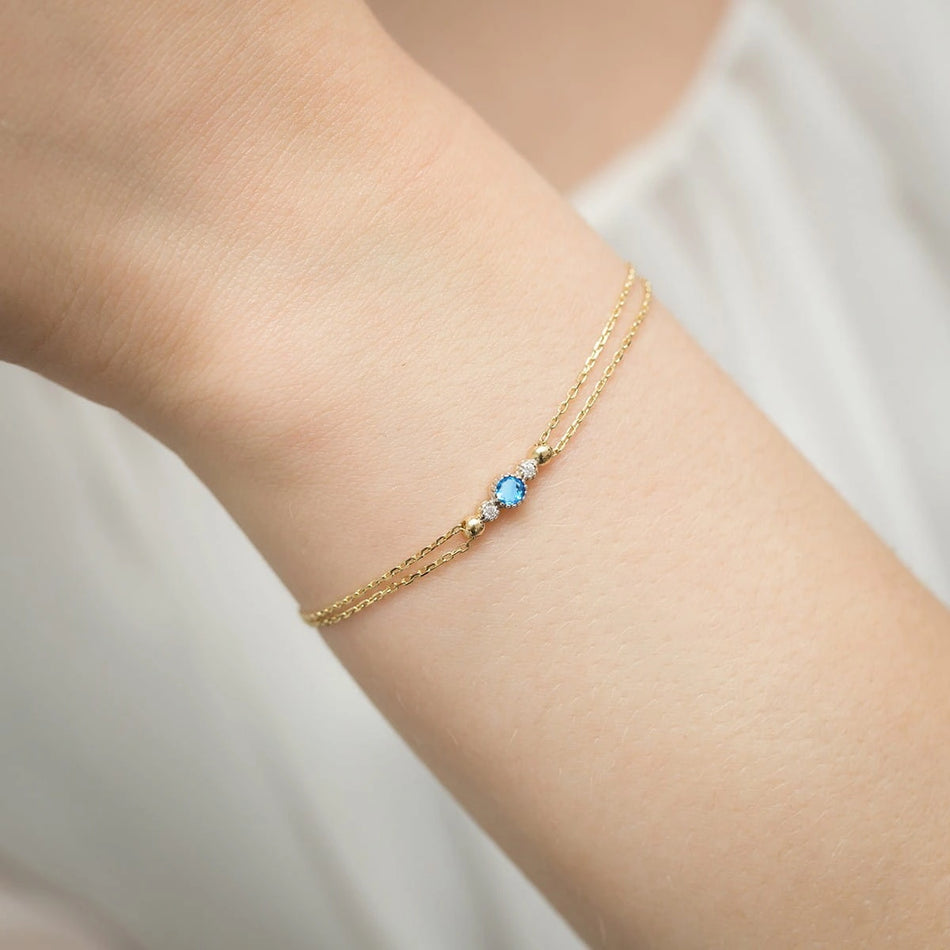 Goldarmband mit 0,15 ct Topas und 0,029 ct Diamanten