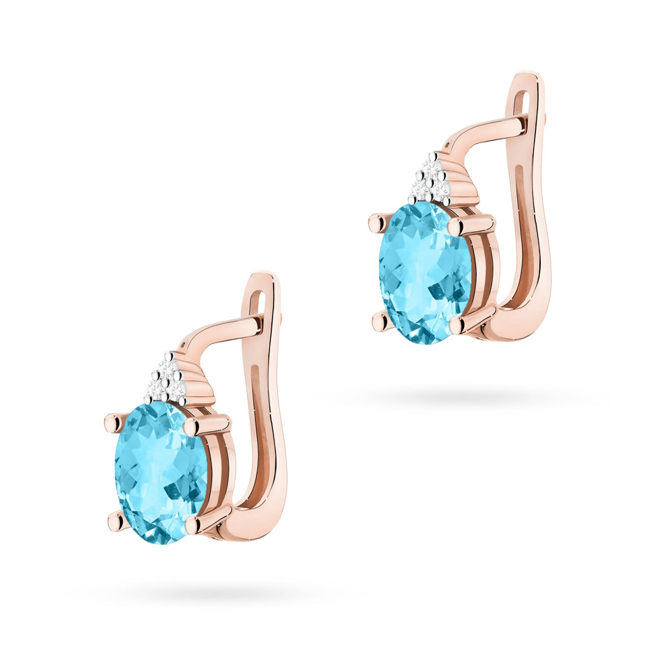Goldohrringe mit 0,90 ct Topasen und 0,052 ct Diamanten
