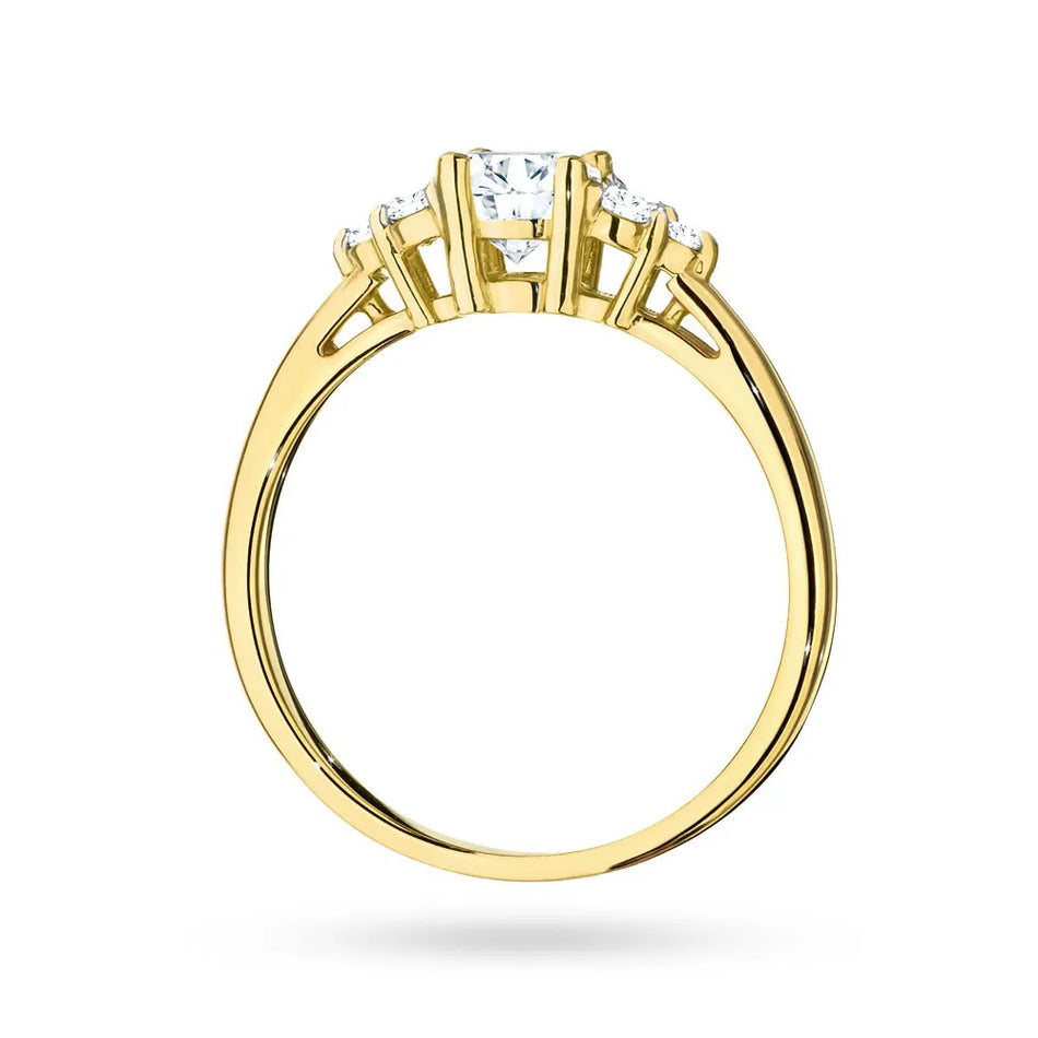 Goldring mit 0,60ct weißem Saphir und 6 Diamanten