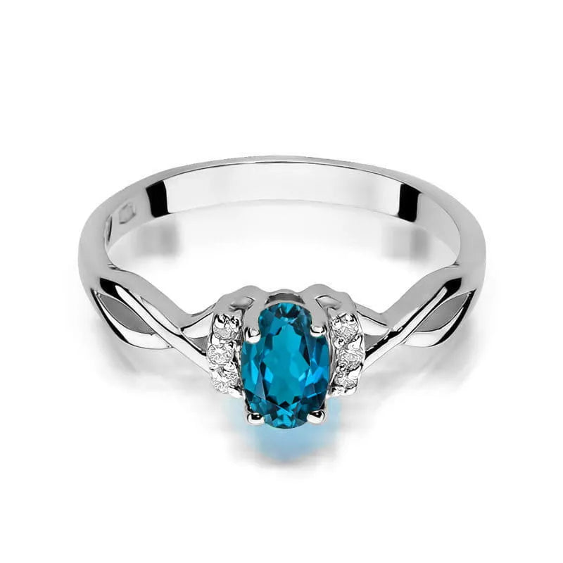 Goldring mit 0,50 ct London Blue Topas und 0,052 ct Diamanten