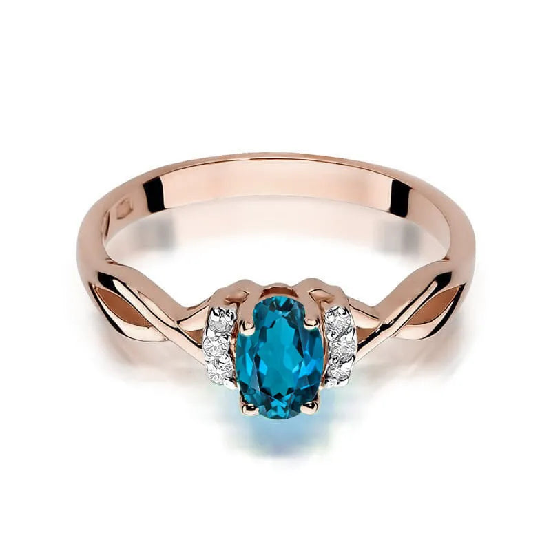 Goldring mit 0,50 ct London Blue Topas und 0,052 ct Diamanten