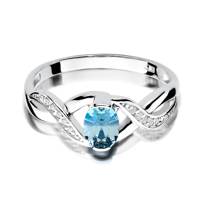 Goldring mit 0,50 ct Topas und 0,05 ct Diamanten