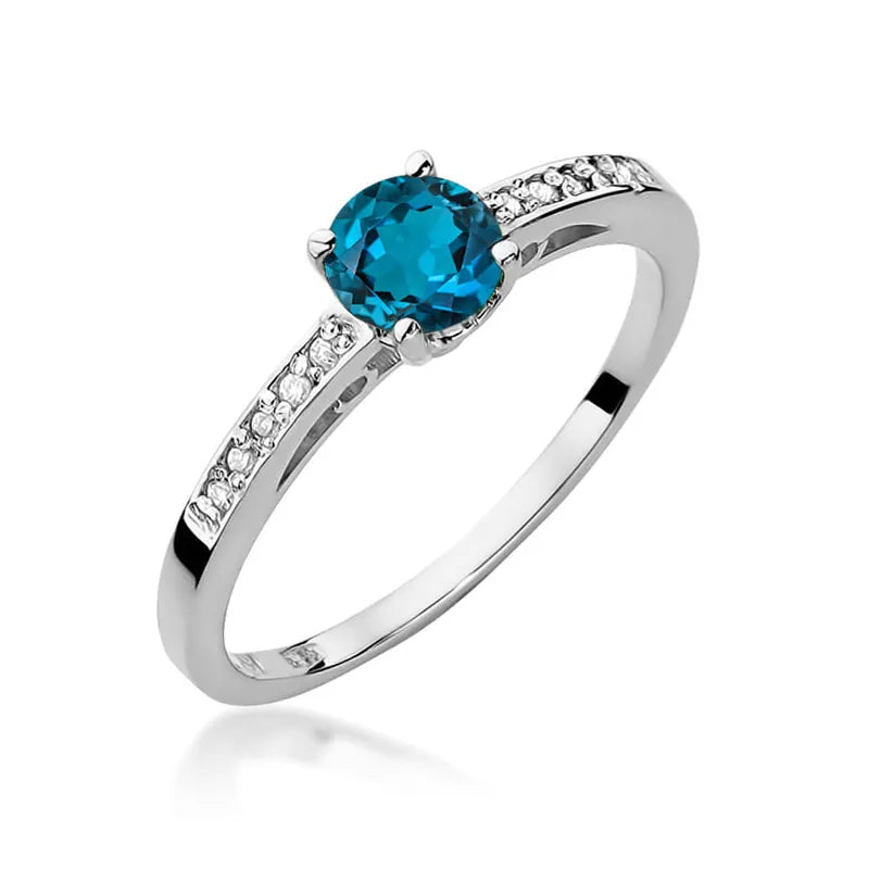 Goldring mit 0,50 ct Topas London Blue und 0,05 ct Diamanten