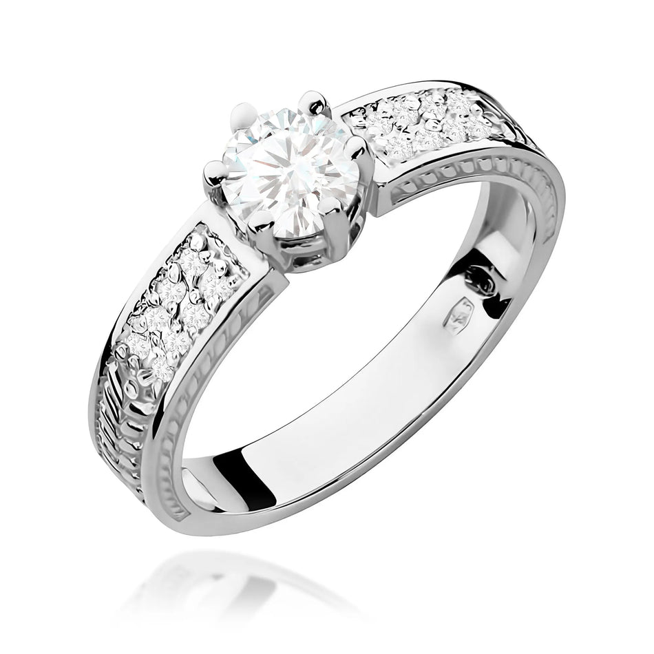 Goldring mit 0,60 ct weißem Saphir und 0,08 ct Diamanten