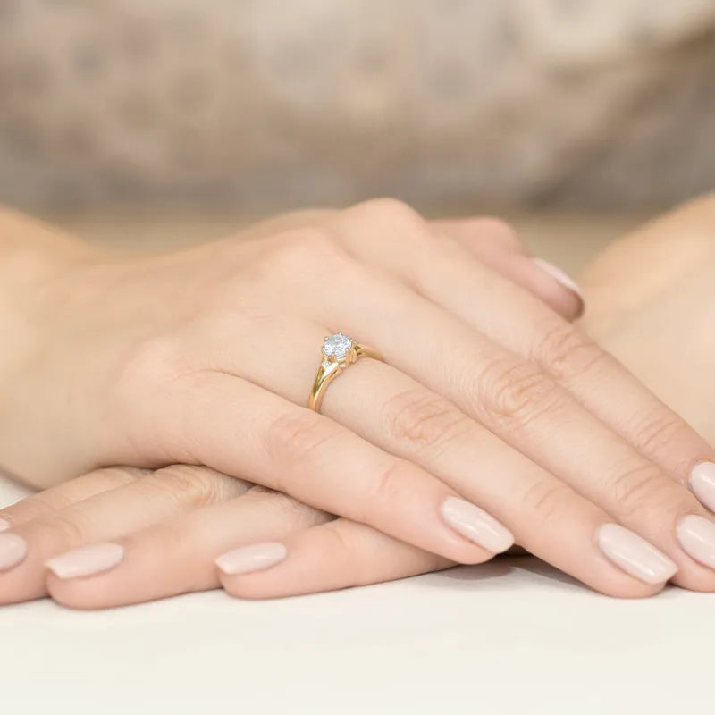 Gold Ring with 0.60ct White sapphire and Diamonds