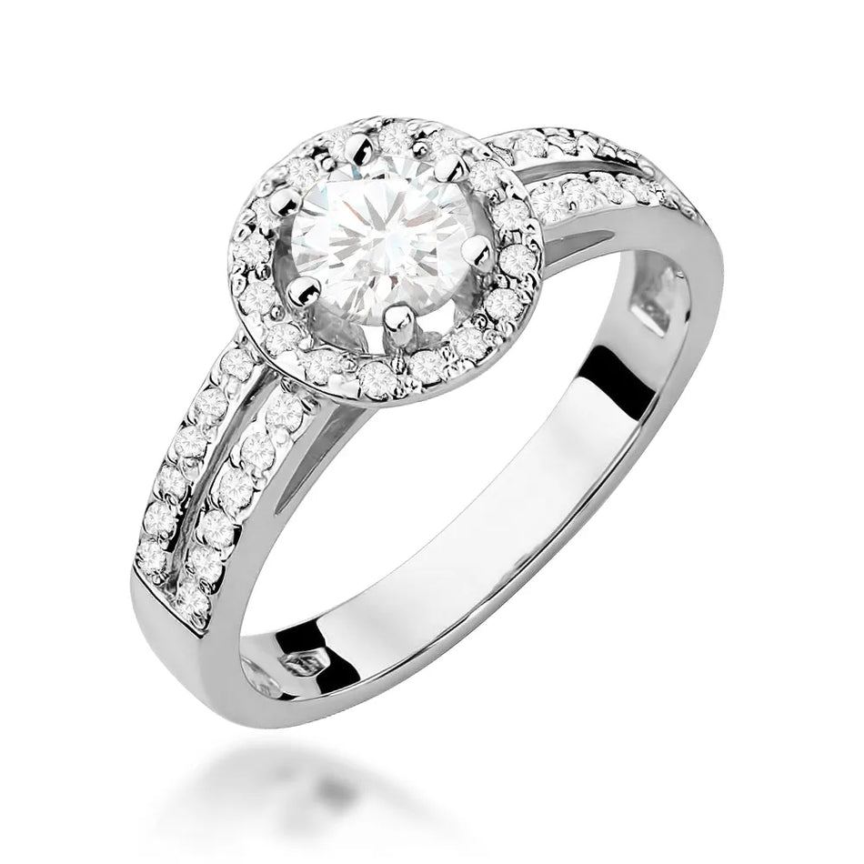 Goldring mit 0,60 ct weißem Saphir und 0,20 ct Diamanten