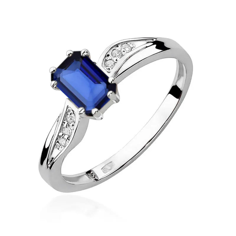 Goldring mit 0,60 ct Saphir und 0,03 ct Diamanten