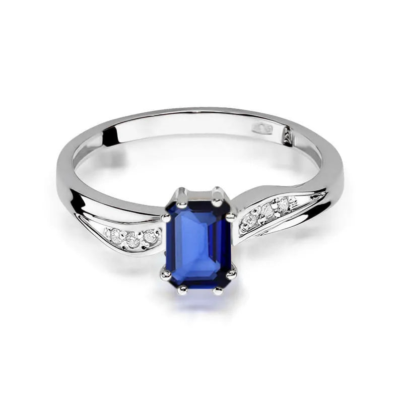 Goldring mit 0,60 ct Saphir und 0,03 ct Diamanten