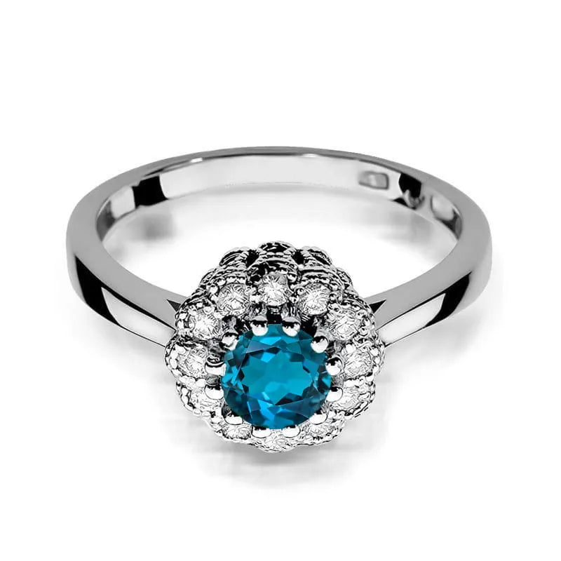 Goldring mit 0,50 ct London Blue Topas und 0,174 ct Diamanten