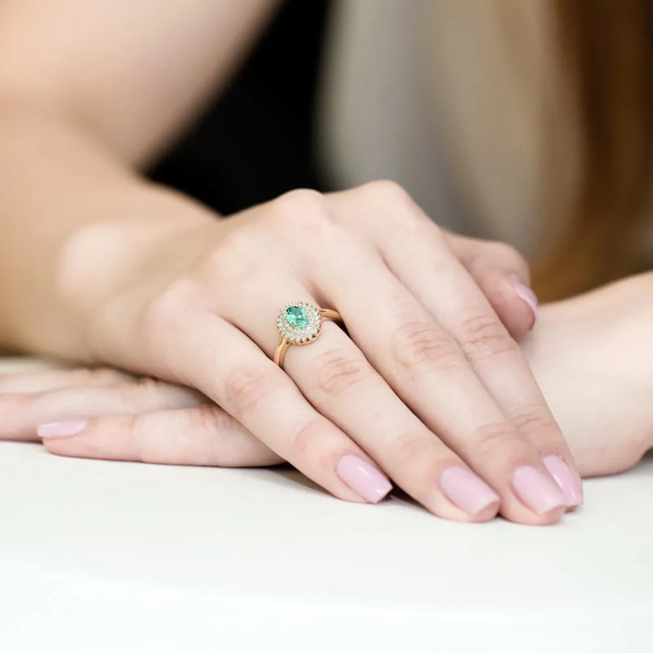 Goldring mit 0,40 ct Smaragd und 0,195 ct Diamanten