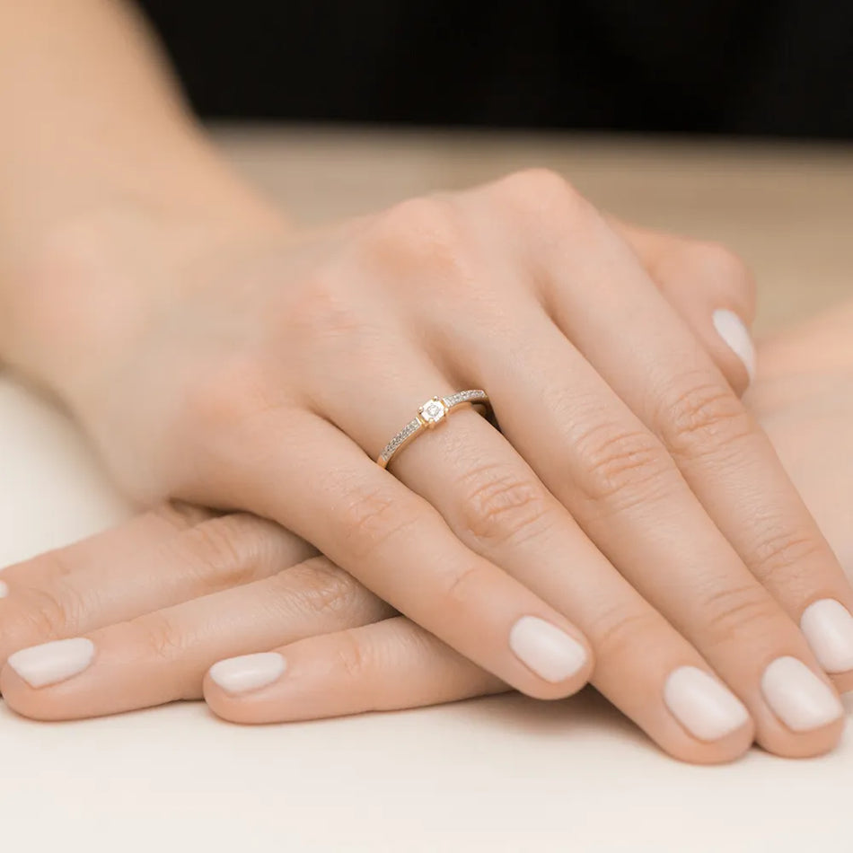 Gold Ring with 0.02ct and 0.05ct Diamonds