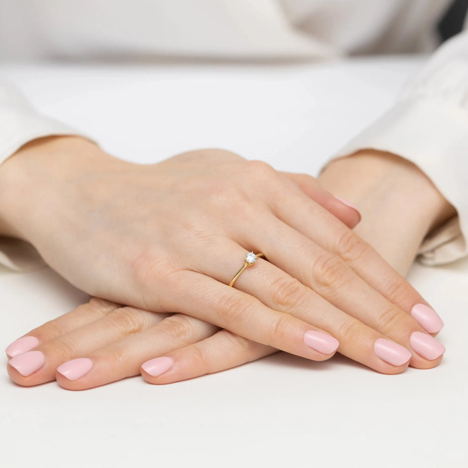 Gold Ring with 0.25ct and 0.01ct Diamonds