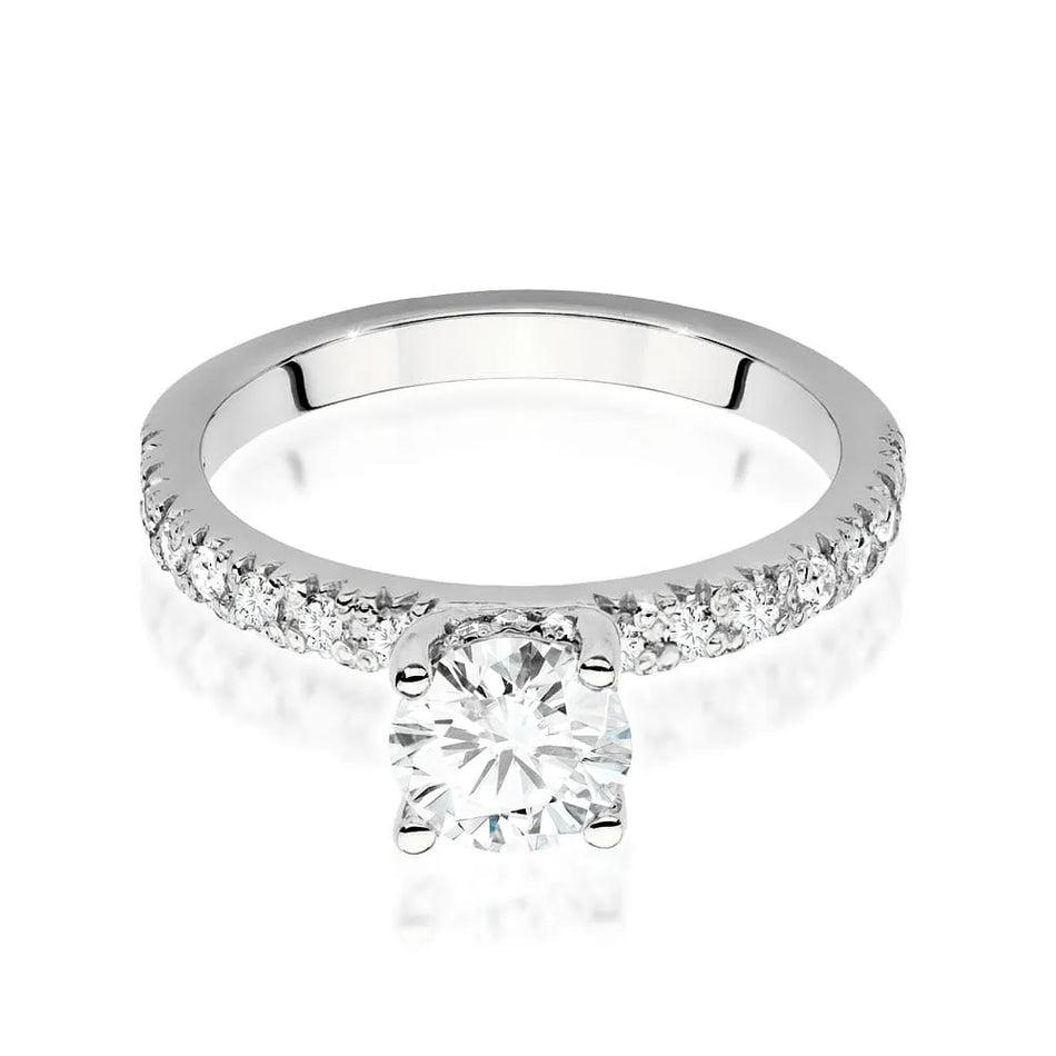 Goldring mit 0,70 ct Diamant und 0,263 ct Seitensteinen