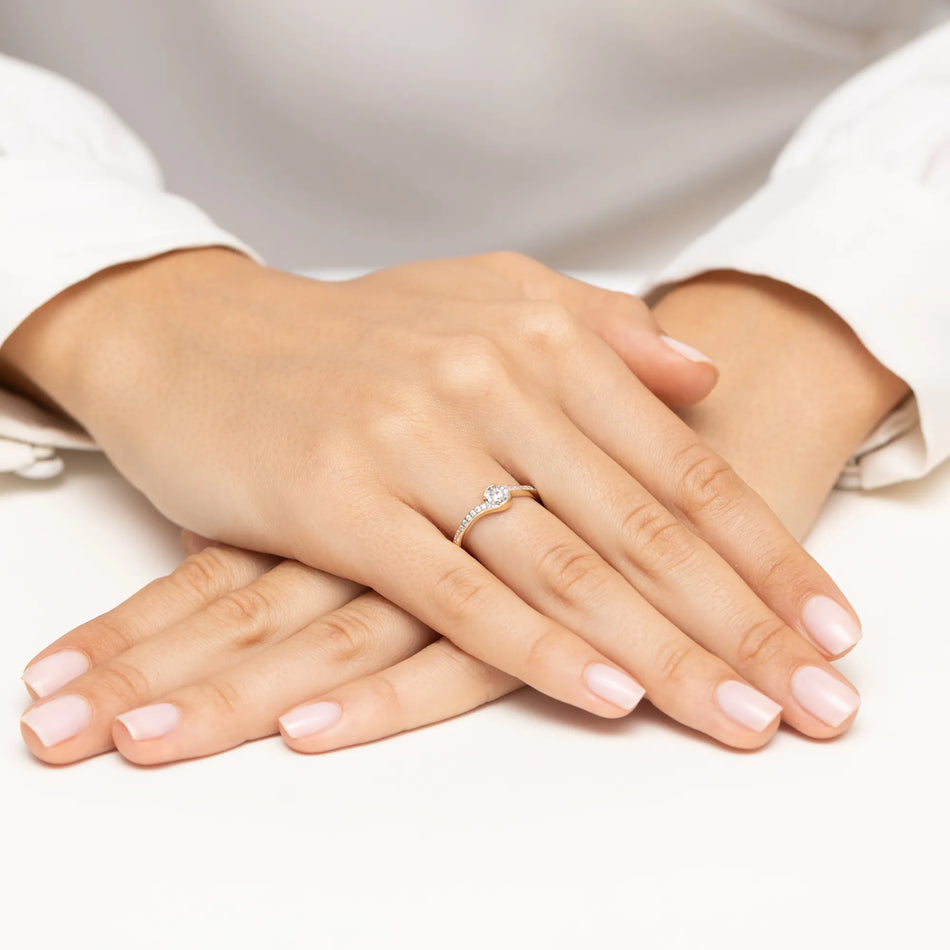 Goldring mit 0,08 ct und 0,08 ct Diamanten