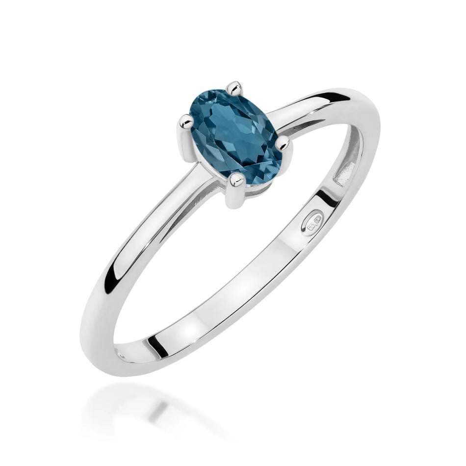 Goldring mit 0,50 ct Topas London Blue