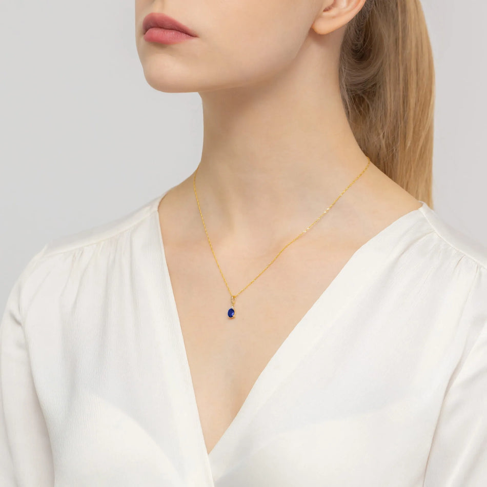 Gold Anhänger mit 0,90 ct Saphir und 0,026 ct Diamanten