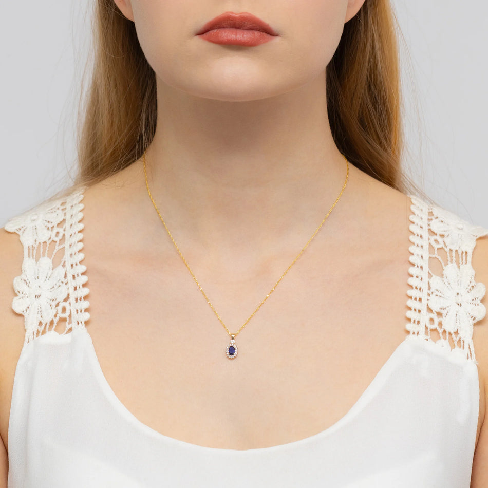 Gold Pendant with 0.70ct Sapphire and 0.095ct Diamonds