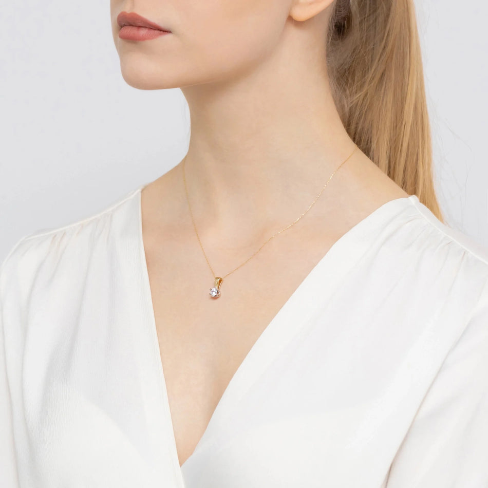 Gold Anhänger mit 0,70 ct Diamant